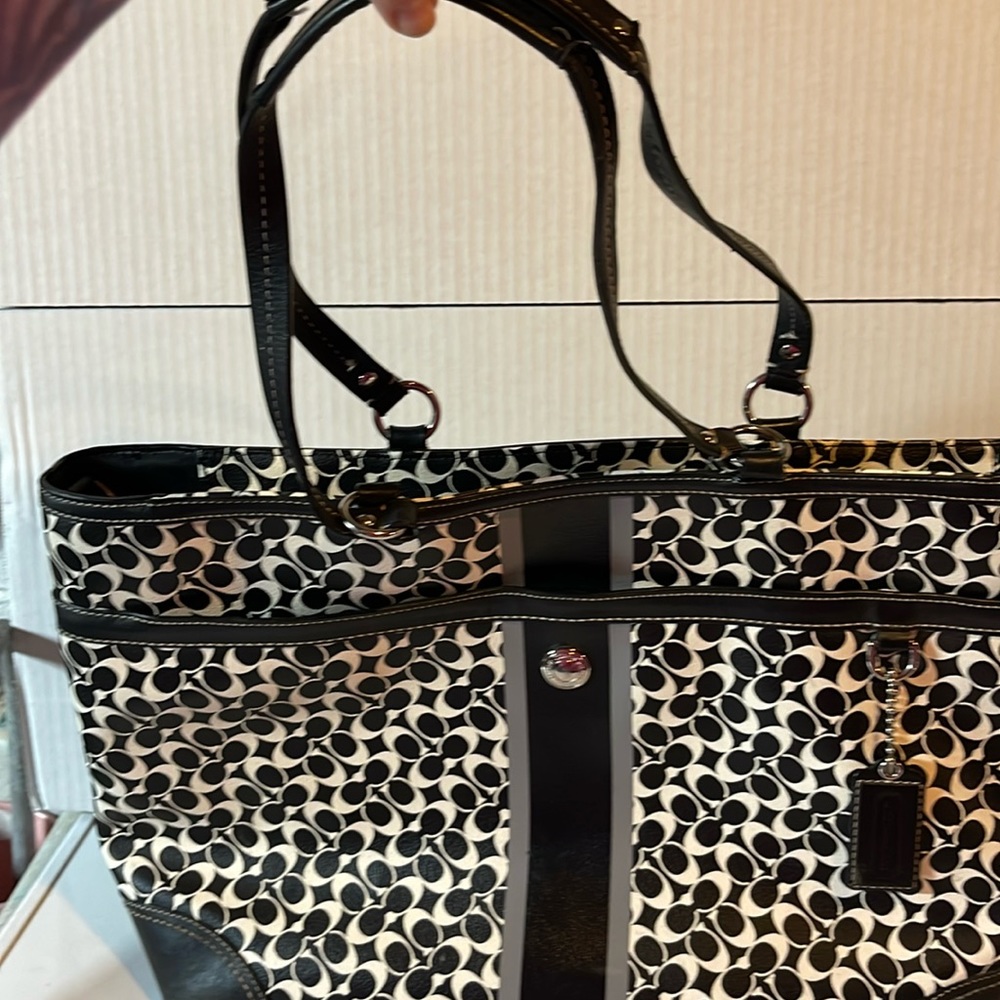 Black and white white coach purse